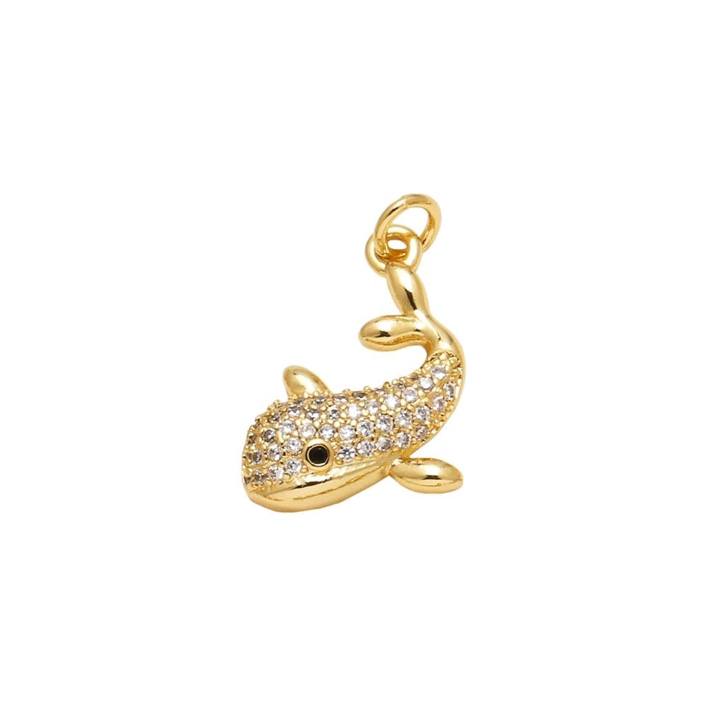 Crystal Whale Dangle Charm in gold-plated copper on white background