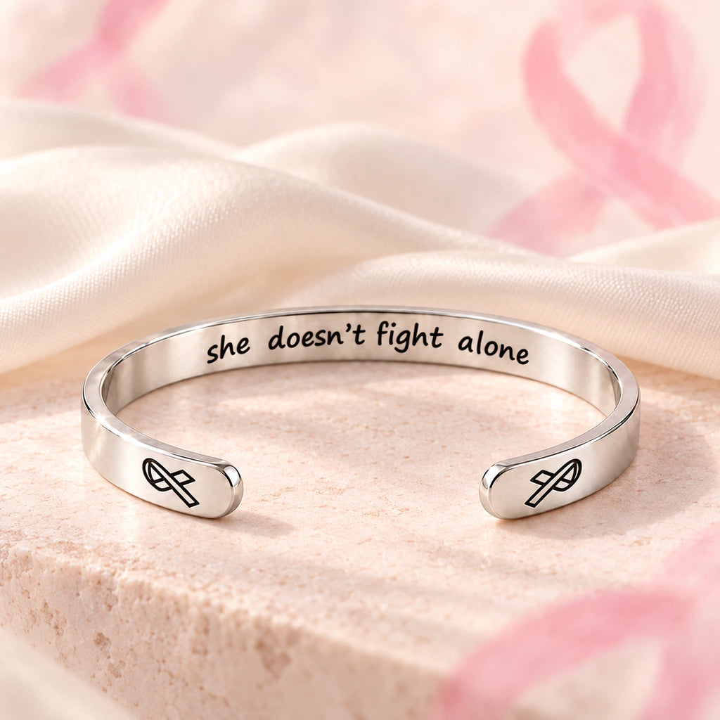 Silver cancer-support cuff – she doesn’t fight alone inner engraving and ribbon ends