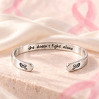 Silver cancer-support cuff – she doesn’t fight alone inner engraving and ribbon ends