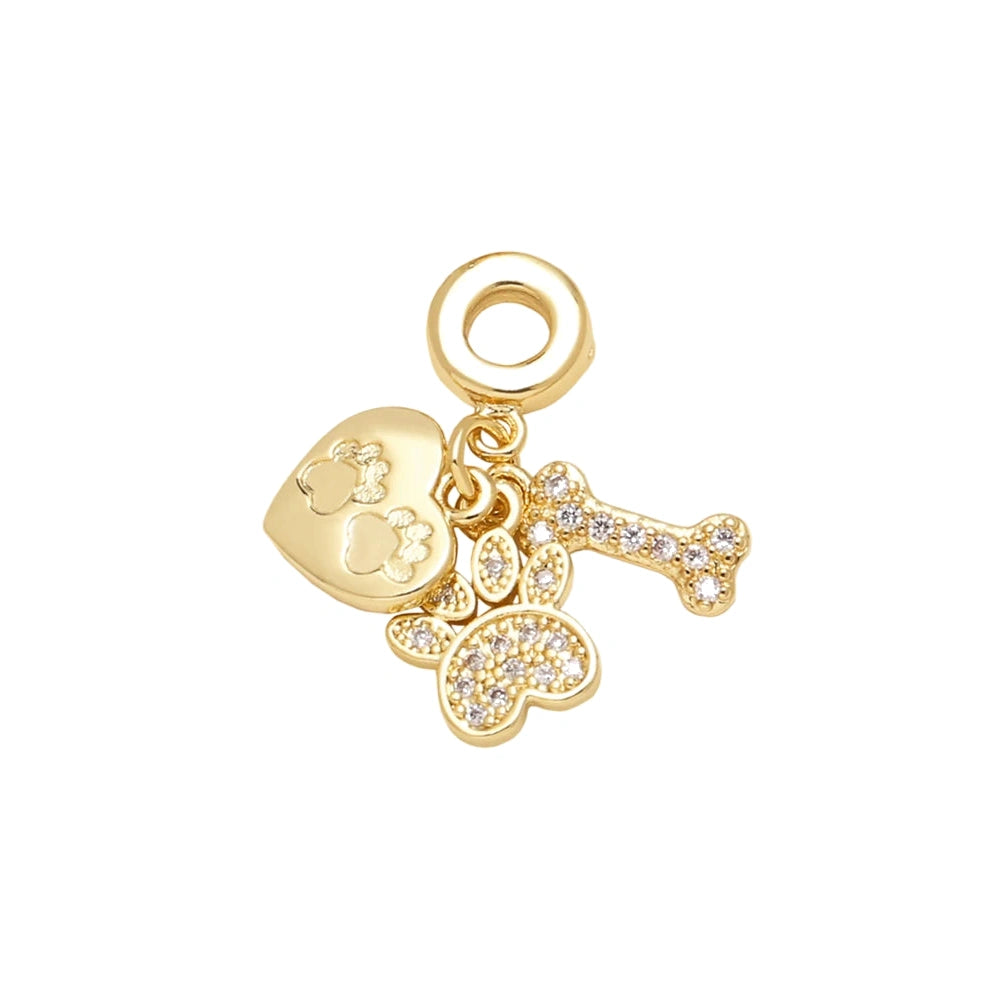 Paw, Heart & Bone Dangle Charm in gold-plated copper on white background