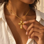 Close-up of the Ember Cross Necklace pendant and beaded chain