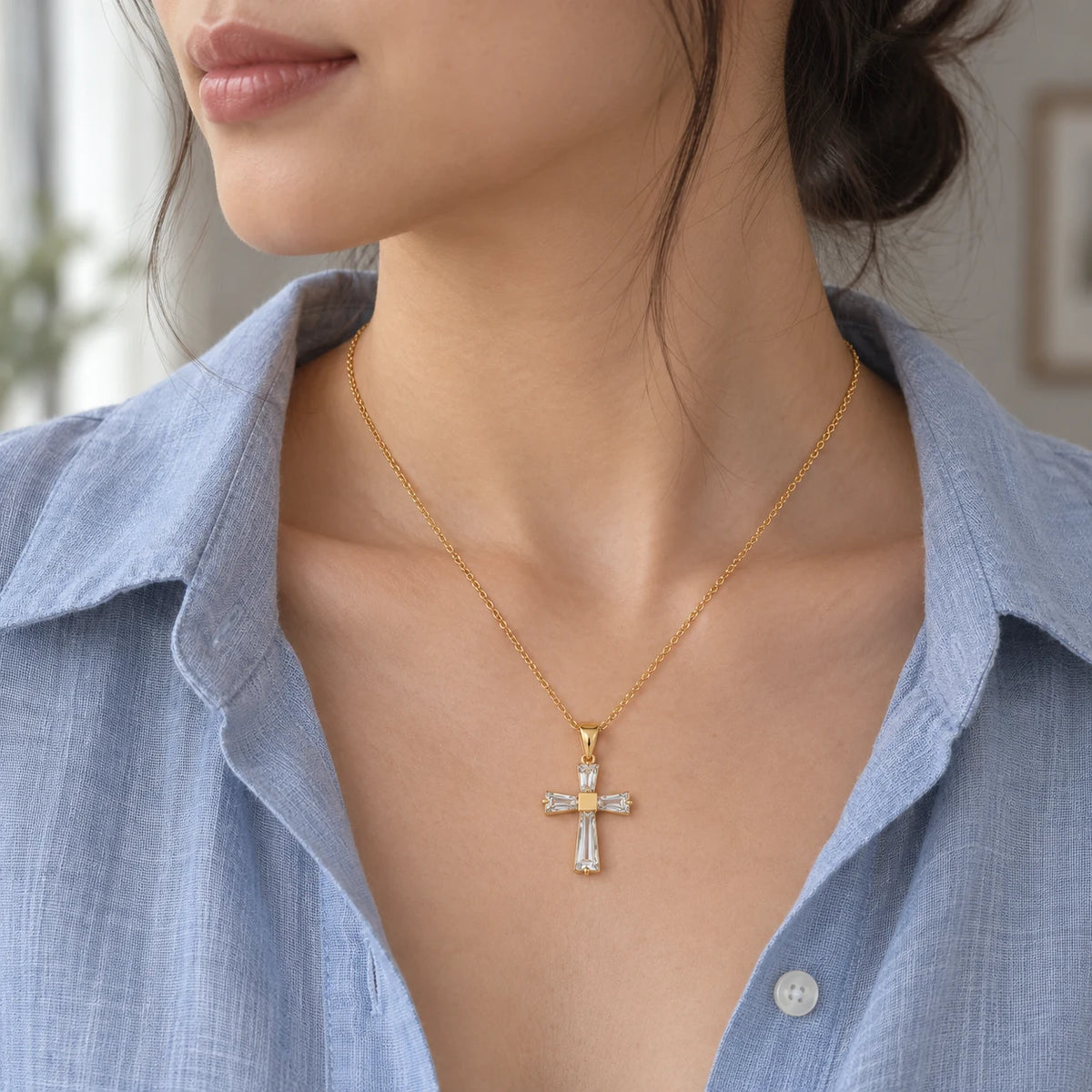 Haven Cross Necklace styled with a blue linen shirt