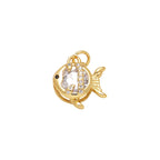Clear Crystal Fish Dangle Charm in gold-plated copper on white background