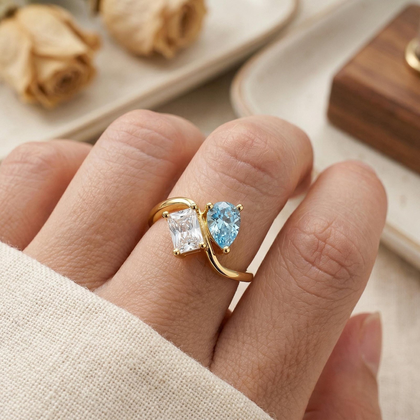 Personalized two stone birthstone ring with clear and blue stones
