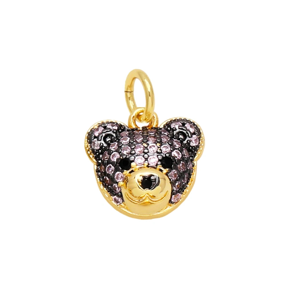 Pink Crystal Bear Face Dangle Charm in gold-plated copper on white background
