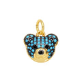 Turquoise Crystal Bear Face Dangle Charm in gold-plated copper on white background