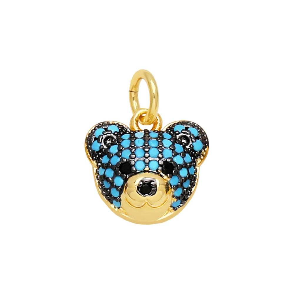 Turquoise Crystal Bear Face Dangle Charm in gold-plated copper on white background