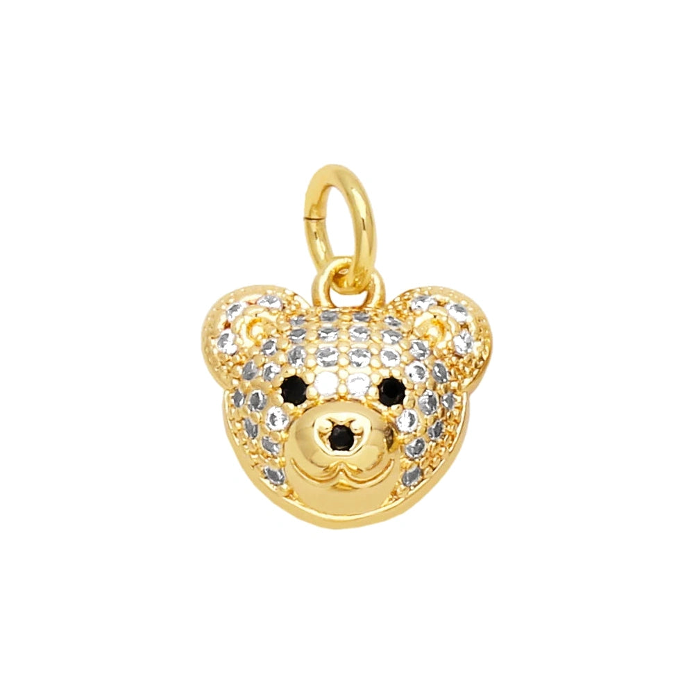Clear Crystal Bear Face Dangle Charm in gold-plated copper on white background