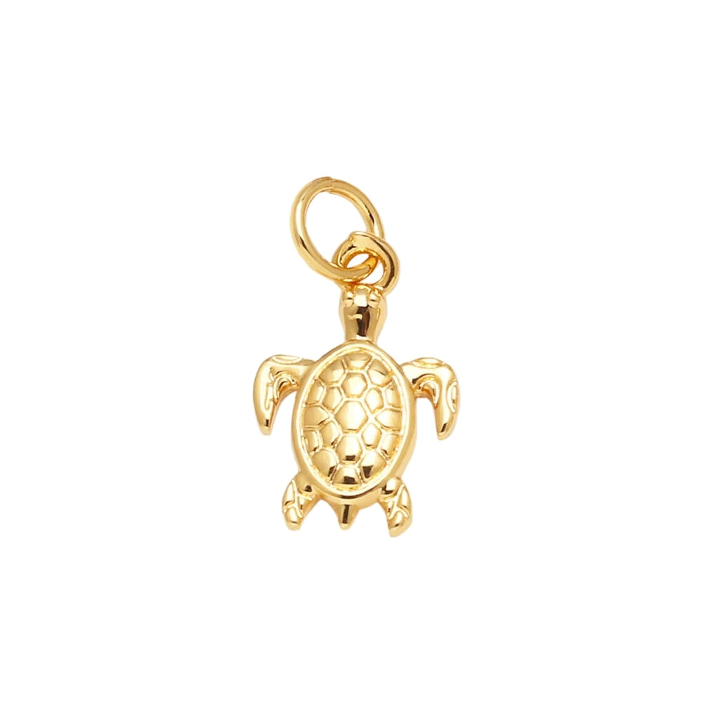 Gold Sea Turtle Dangle Charm in gold-plated copper on white background