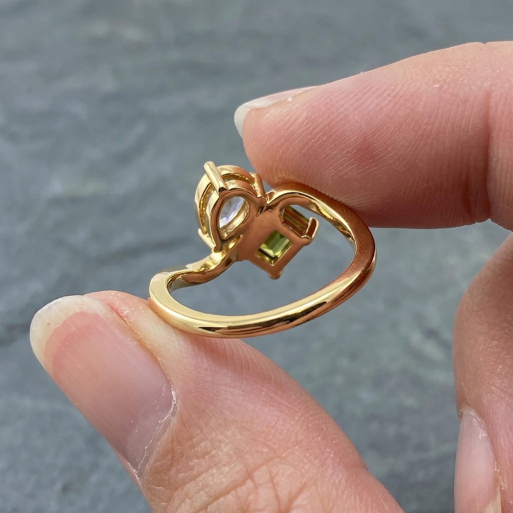 Close view of the secure prong setting on the two stone birthstone ring