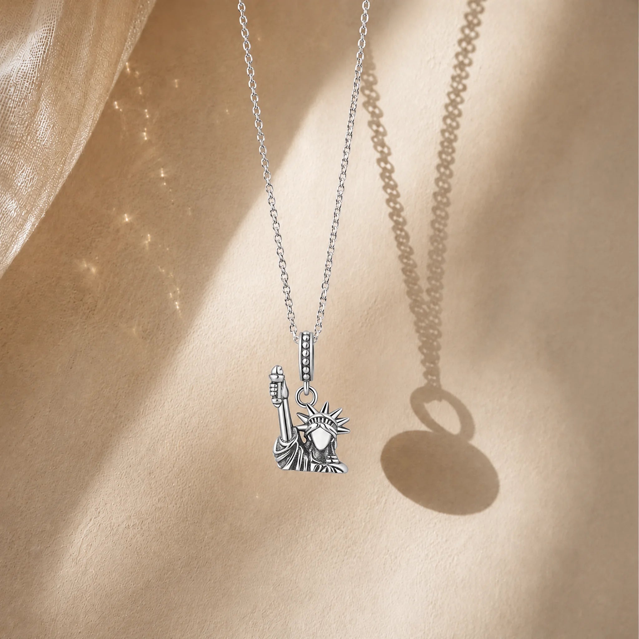 CALEO lifestyle necklace image - Statue of Liberty Dangle Charm - 2026-07-22