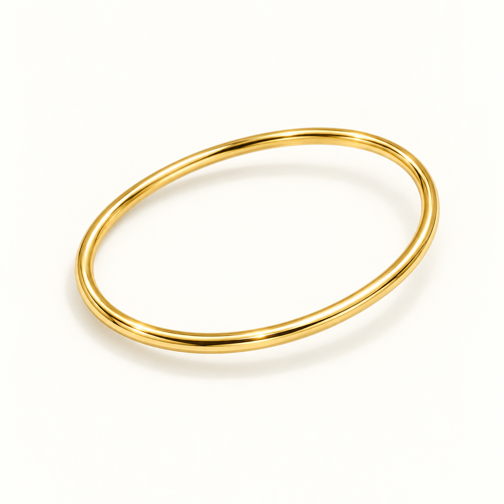 The Aurelia Essential Bangle in Gold, 45 degree view