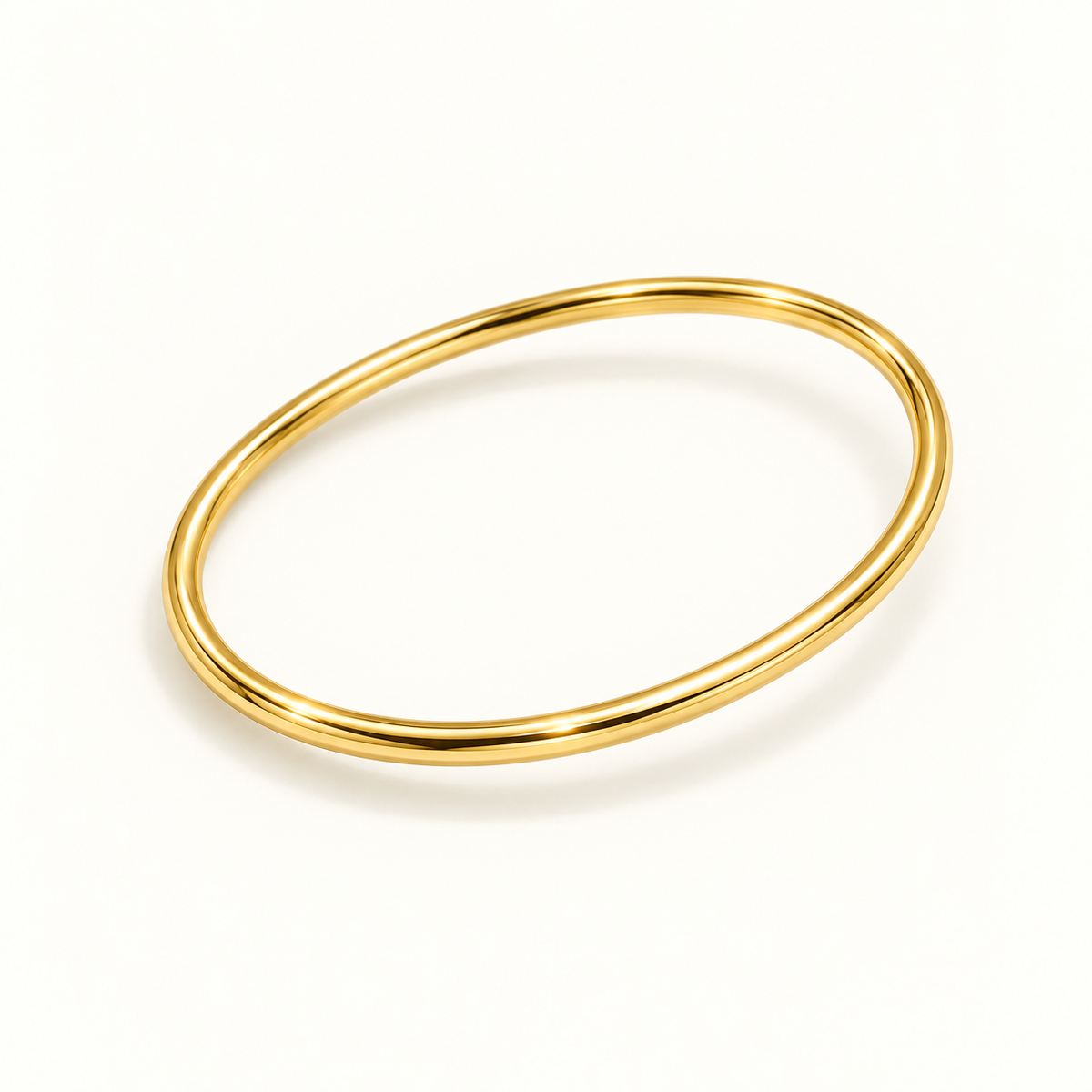 The Aurelia Essential Bangle in Gold, 45 degree view