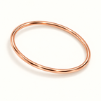 The Aurelia Essential Bangle in Rose Gold, 45 degree view