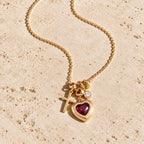 Beloved Heart Charm Necklace - flatlay gold travertine