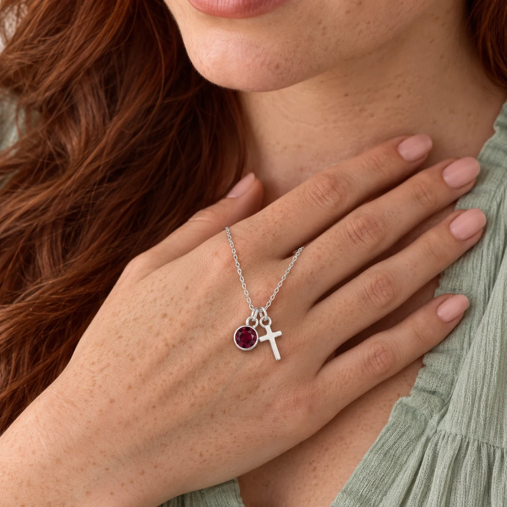 Birthstone Grace Cross Necklace - lifestyle silver garnet hand