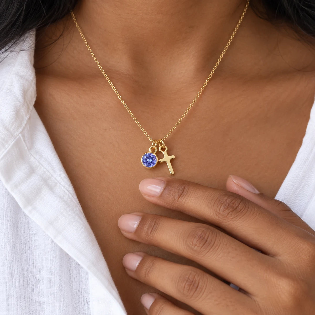 Birthstone Grace Cross Necklace - lifestyle gold tanzanite hand