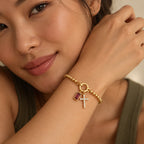 Blessed Birthstone Cross Bracelet - blessed birthstone cross bracelet gold garnet worn