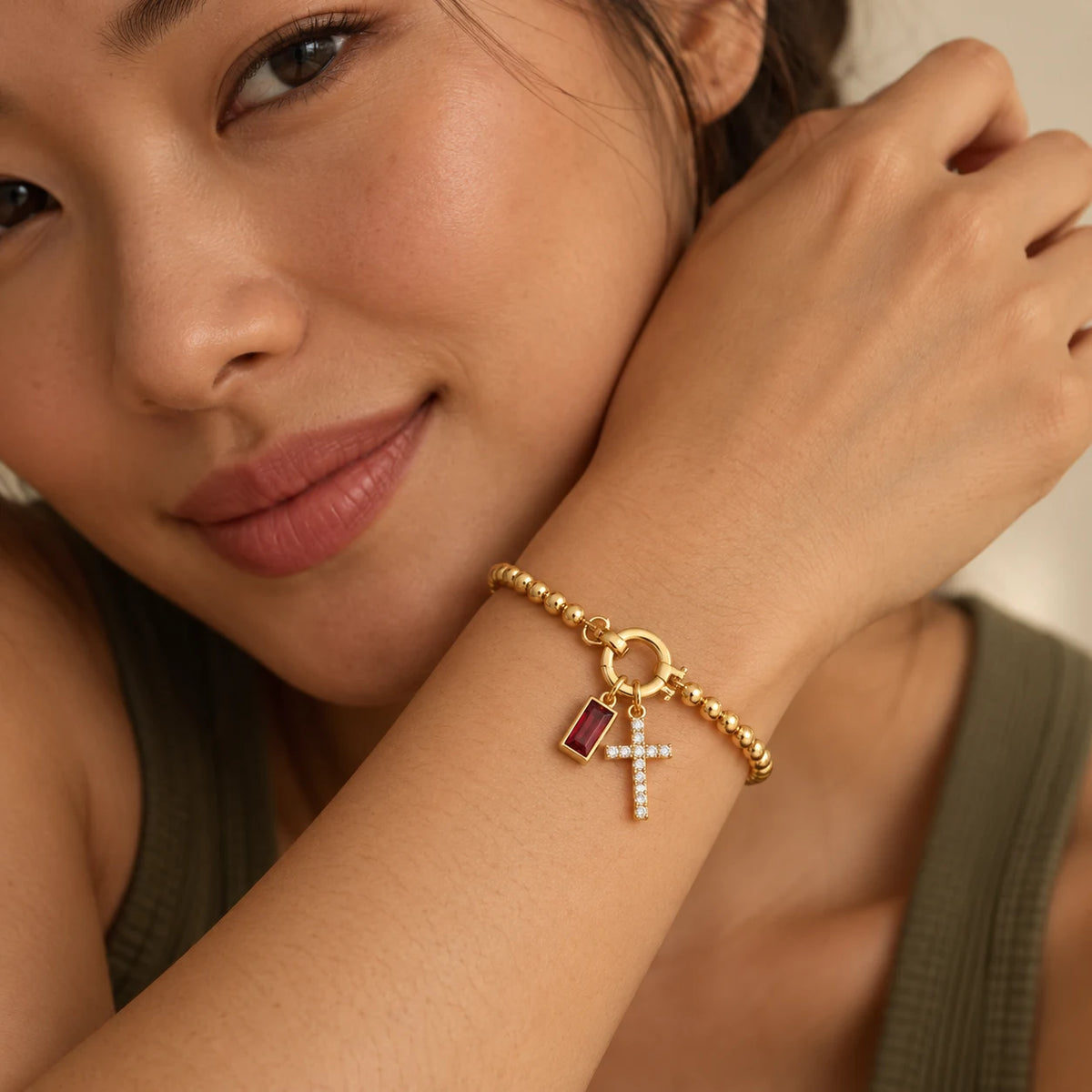 Blessed Birthstone Cross Bracelet - blessed birthstone cross bracelet gold garnet worn