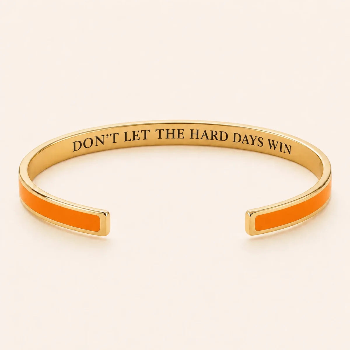 Don't Let The Hard Days Win cuff bracelet - Gold finish, Orange enamel, full quote
