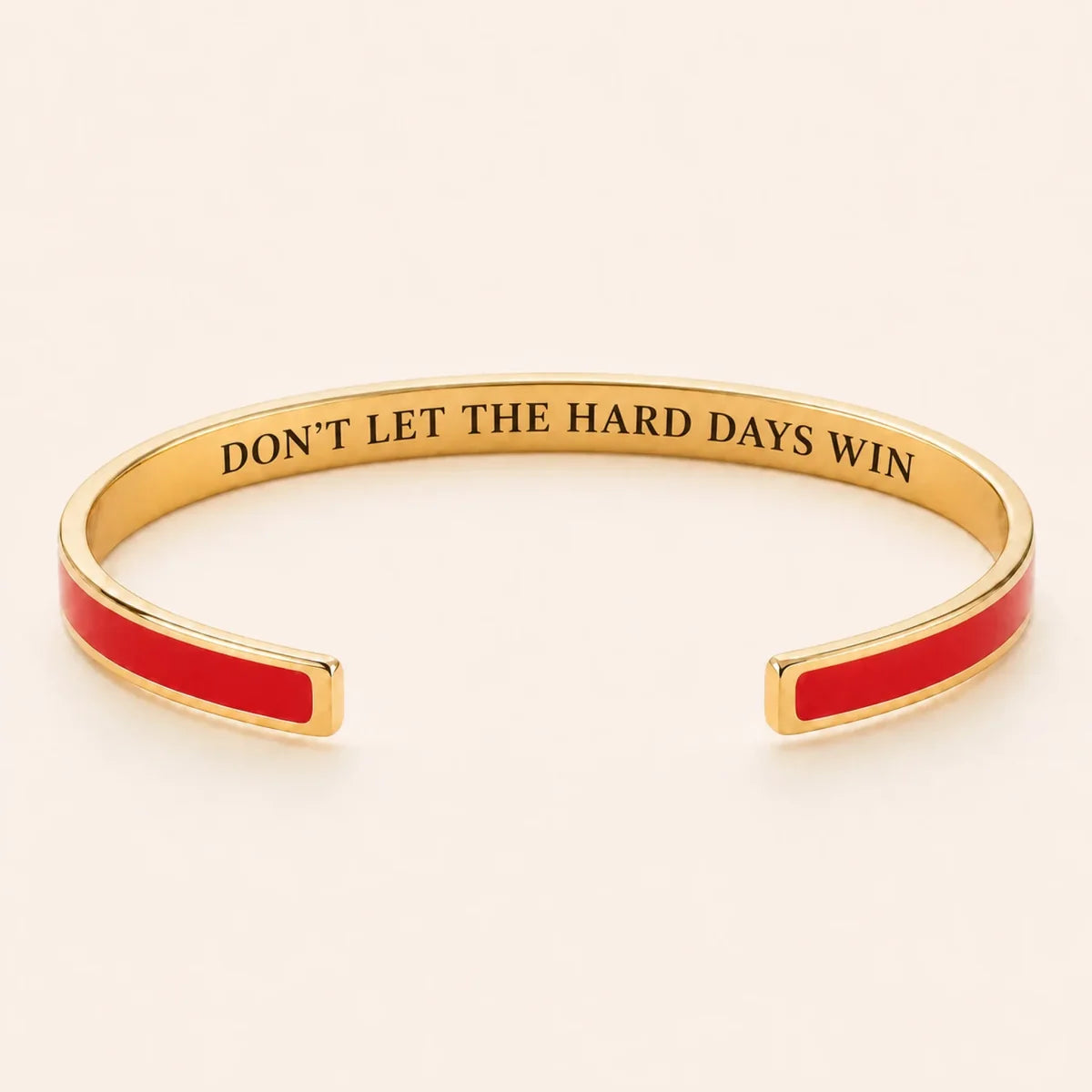Don't Let The Hard Days Win cuff bracelet - Gold finish, Red enamel, full quote