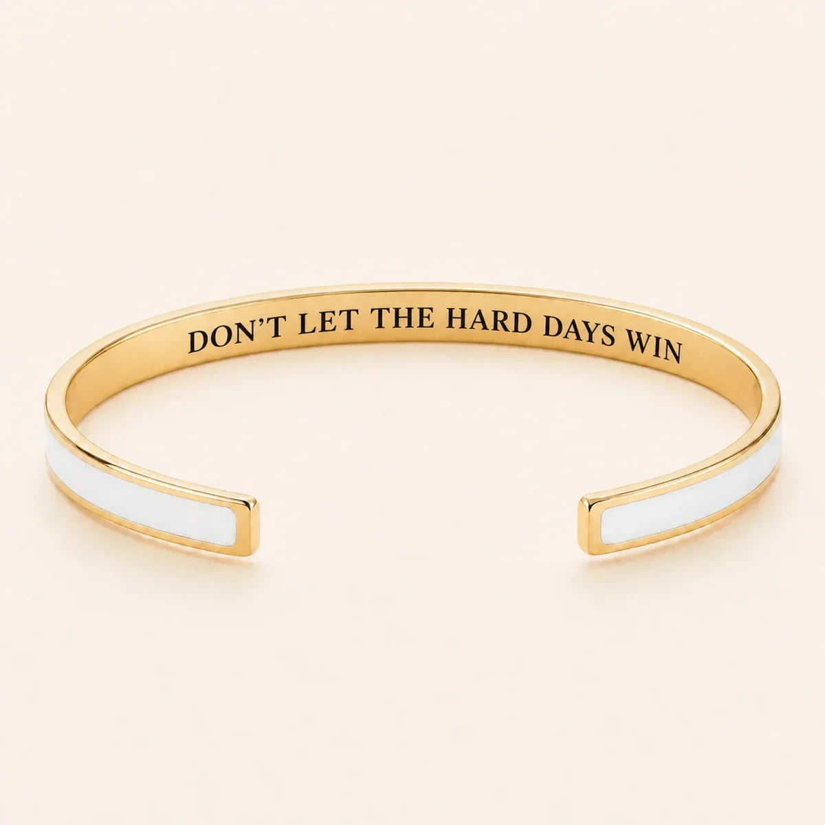 Don't Let The Hard Days Win cuff bracelet - Gold finish, White enamel, full quote