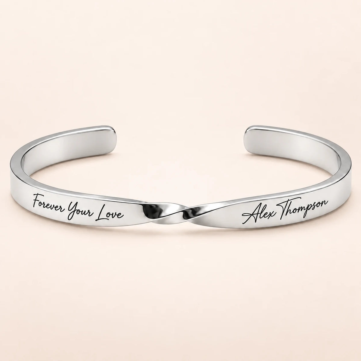Silver Custom Engraved Twist Cuff Bracelet on blush ivory background