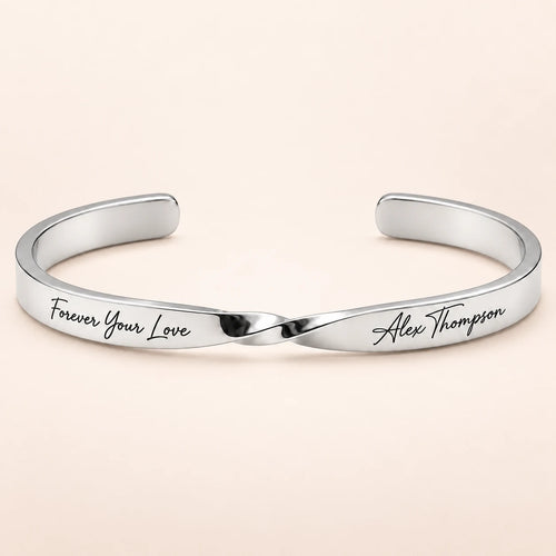 Silver Custom Engraved Twist Cuff Bracelet on blush ivory background