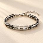 Dad Bracelet with Kids' Names — neutral product still life
