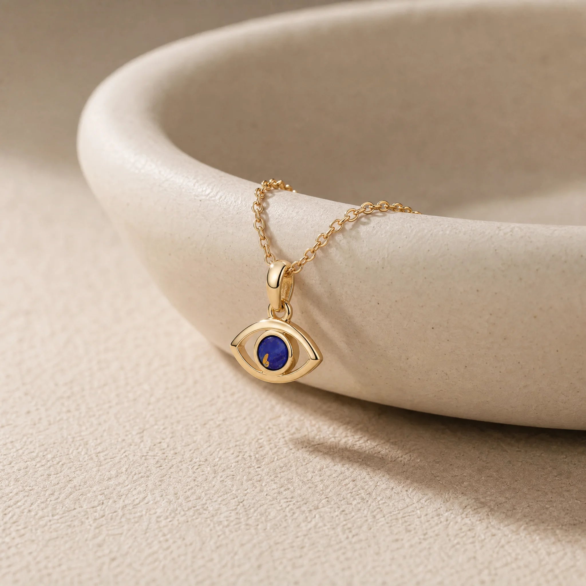 CALEO dangle lifestyle image - Gold Blue Evil Eye Dangle Charm - dangle-one-thumb-ref01-gold-blue-evil-eye-dangle-charm - 2026-07-24