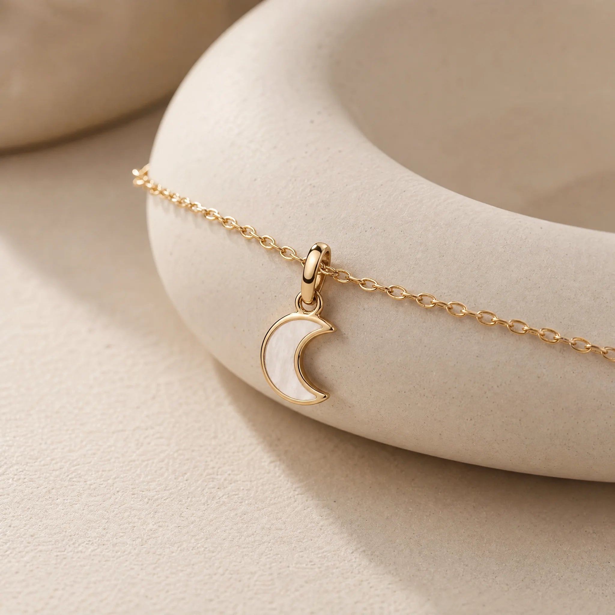 CALEO dangle lifestyle image - Gold Crescent Moon Dangle Charm - dangle-one-thumb-ref01-gold-crescent-moon-dangle-charm - 2026-07-24