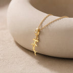 CALEO dangle lifestyle image - Gold Cross Dangle Charm - dangle-one-thumb-ref01-gold-cross-dangle-charm - 2026-07-24