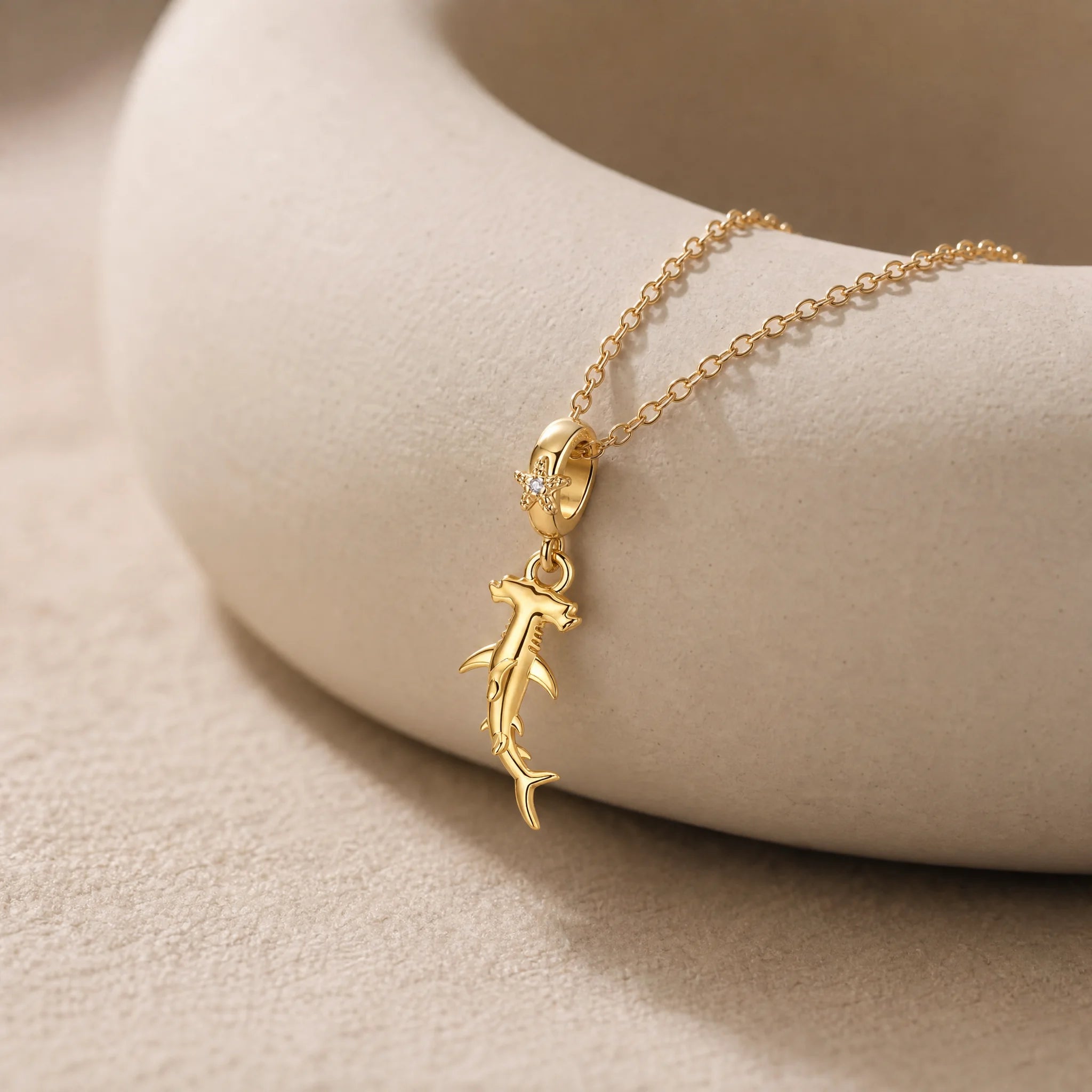 CALEO dangle lifestyle image - Gold Cross Dangle Charm - dangle-one-thumb-ref01-gold-cross-dangle-charm - 2026-07-24