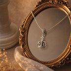 CALEO dangle lifestyle image - Silver Crown Key Dangle Charm - dangle-one-thumb-ref02-silver-crown-key-dangle-charm - 2026-07-24