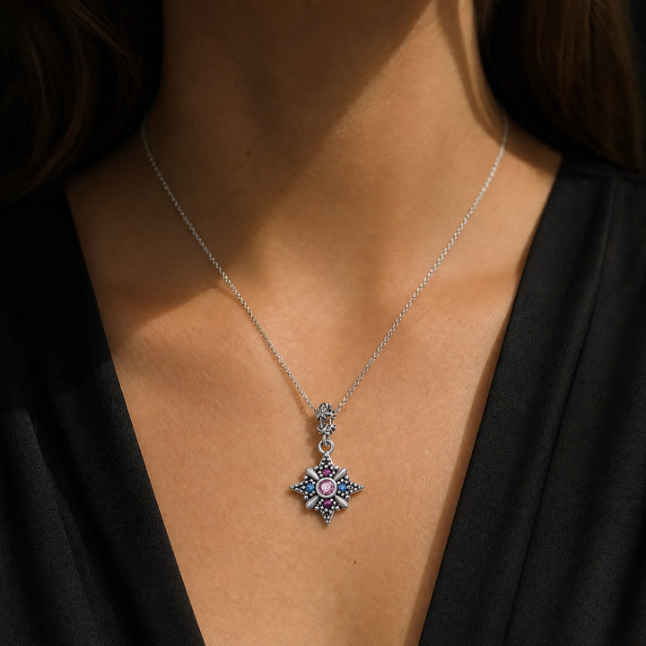 CALEO dangle lifestyle image - Pink Compass Star Dangle Charm - dangle-one-thumb-ref13-pink-compass-star-dangle-charm - 2026-07-24