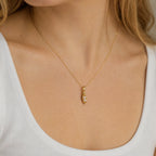 CALEO dangle lifestyle image - Gold Pearl Pea Pod Dangle Charm - dangle-one-thumb-ref15-gold-pearl-pea-pod-dangle-charm - 2026-07-24