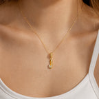 CALEO dangle lifestyle image - Gold Stiletto Dangle Charm - dangle-one-thumb-ref15-gold-stiletto-dangle-charm - 2026-07-24