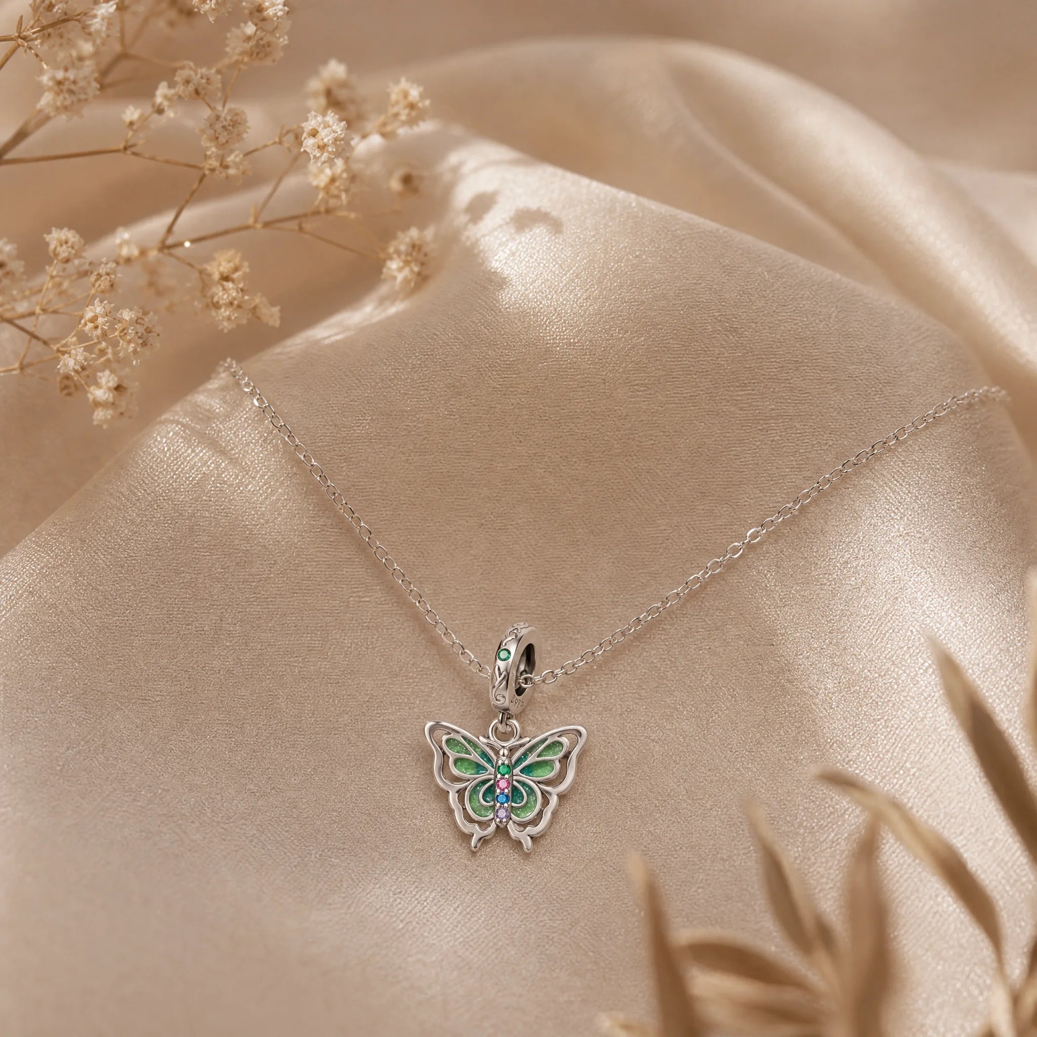 CALEO dangle lifestyle image - Glow-in-the-Dark Green Butterfly Dangle Charm - dangle-one-thumb-ref17-glow-in-the-dark-green-butterfly-dangle-charm - 2026-07-24