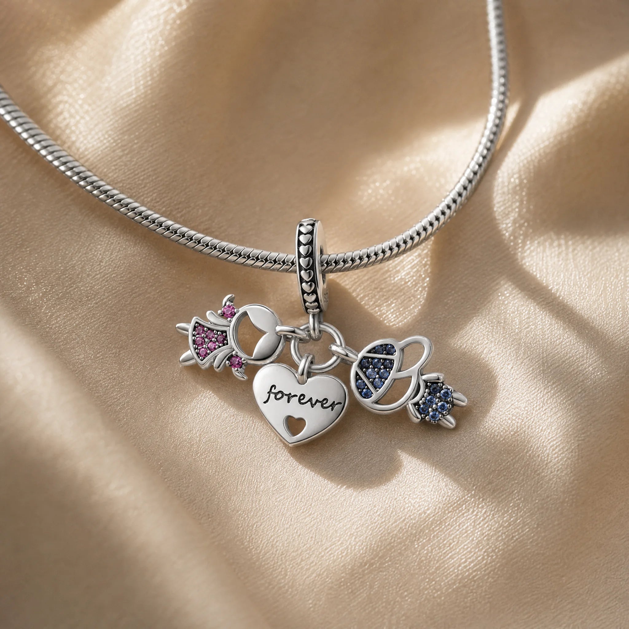 CALEO dangle lifestyle image - Forever Family Heart Dangle Charm - dangle-one-thumb-ref18-forever-family-heart-dangle-charm - 2026-07-24