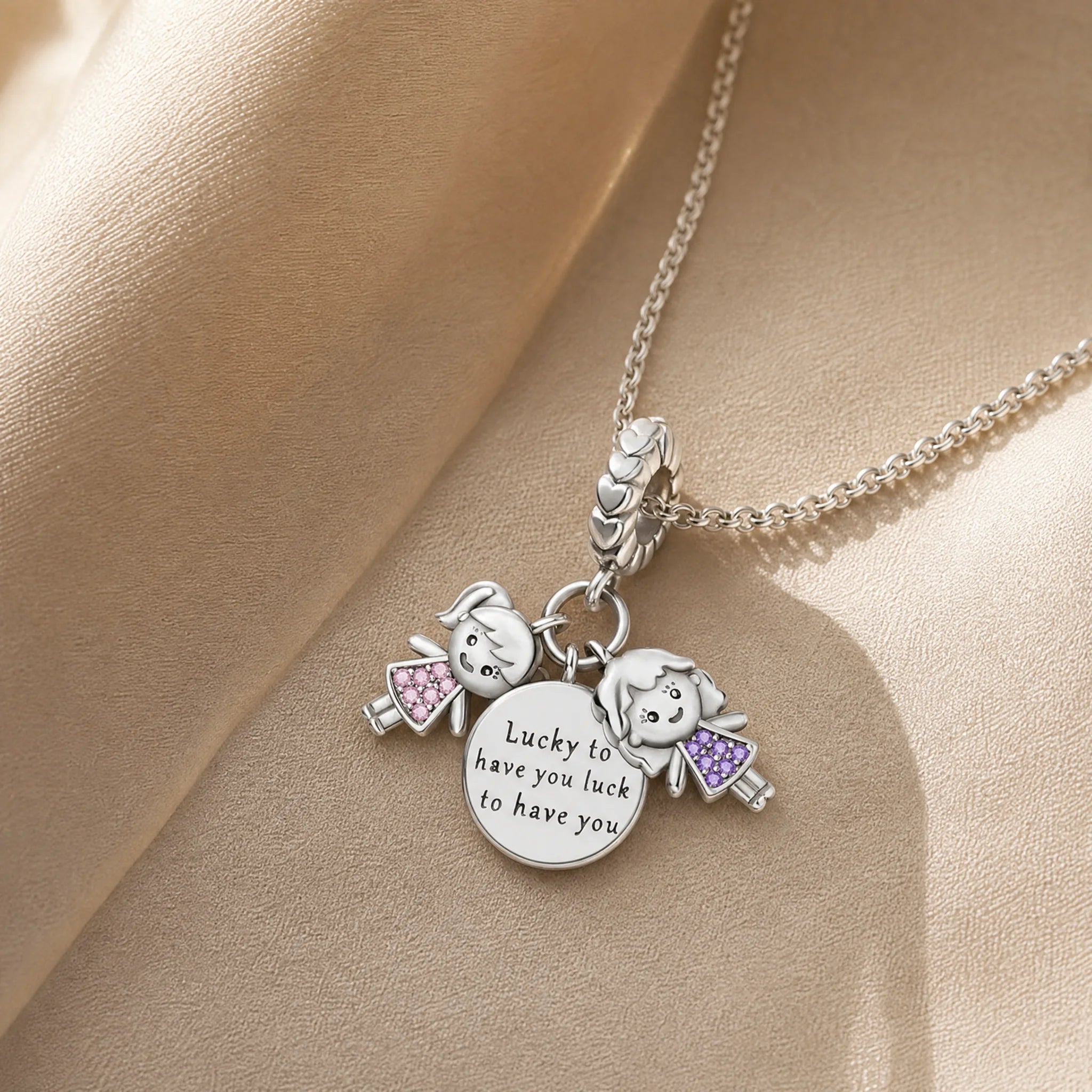 CALEO dangle lifestyle image - Lucky Family Angel Dangle Charm - dangle-one-thumb-ref18-lucky-family-angel-dangle-charm - 2026-07-24