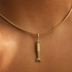 CALEO dangle lifestyle image - Gold Articulated Fish Dangle Charm - dangle-one-thumb-ref20-gold-articulated-fish-dangle-charm - 2026-07-24
