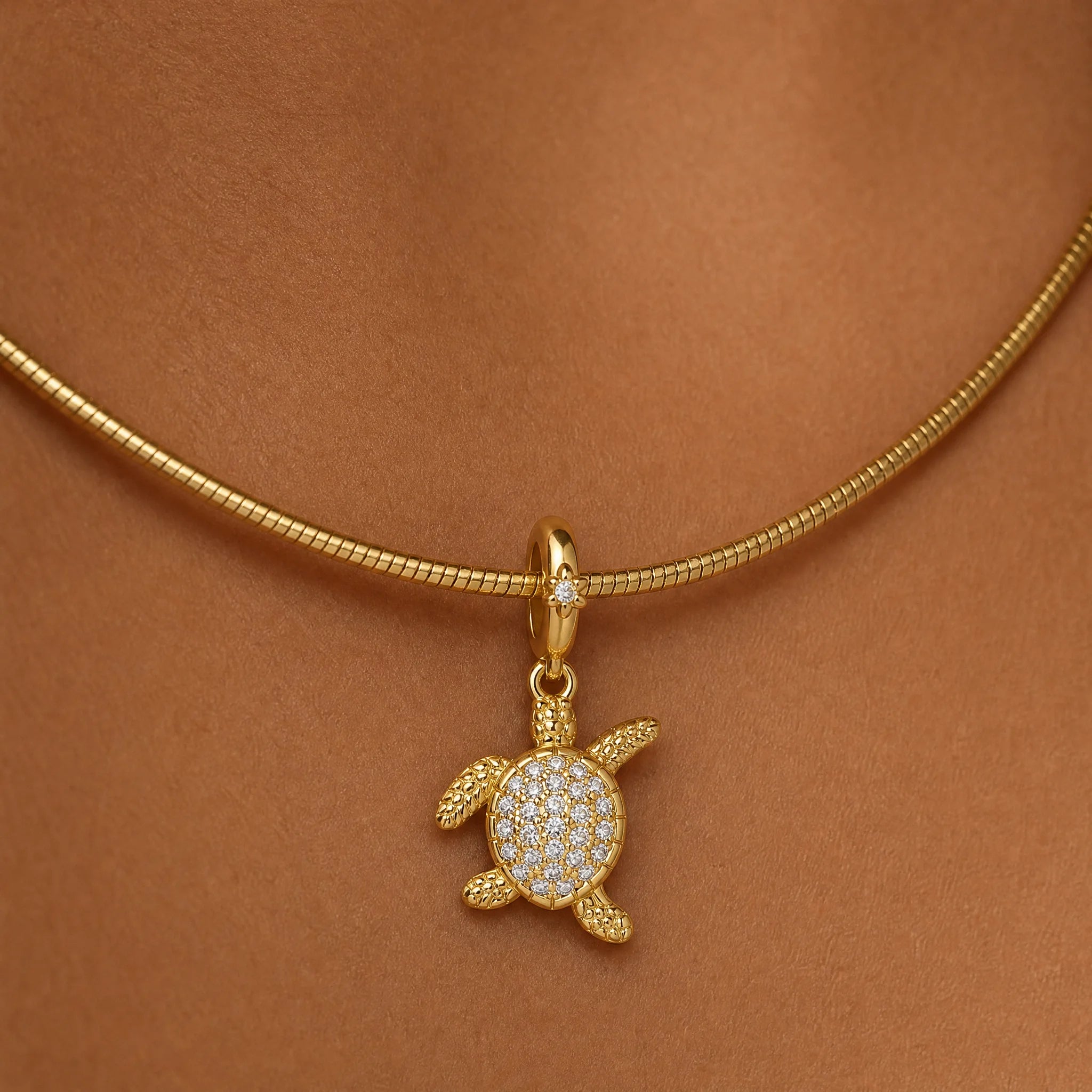 CALEO dangle lifestyle image - Gold Sea Turtle Dangle Charm - dangle-one-thumb-ref20-gold-sea-turtle-dangle-charm-2 - 2026-07-24