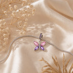 CALEO dangle lifestyle image - Pink Crystal Butterfly Dangle Charm - dangle-one-thumb-ref21-pink-crystal-butterfly-dangle-charm - 2026-07-24