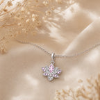 CALEO dangle lifestyle image - Pink Lotus Dangle Charm - dangle-one-thumb-ref21-pink-lotus-dangle-charm - 2026-07-24