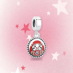 CALEO Japanese charm thumbnail - Daruma Fortune Medallion Dangle Charm - pink star background - 2026-07-22