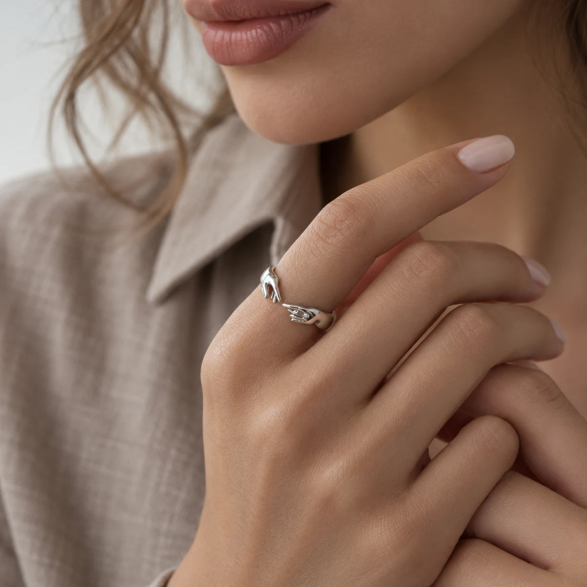 Divine Reach Ring - lifestyle silver hands
