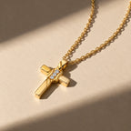 Endless Grace Cross Necklace - still life gold paper