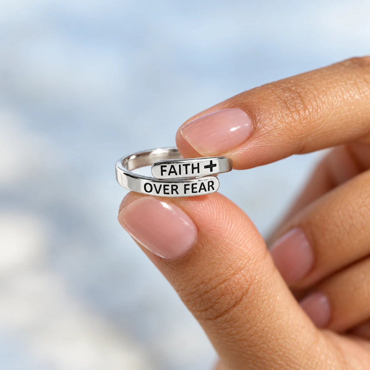 Faith Prevails Ring - lifestyle silver held
