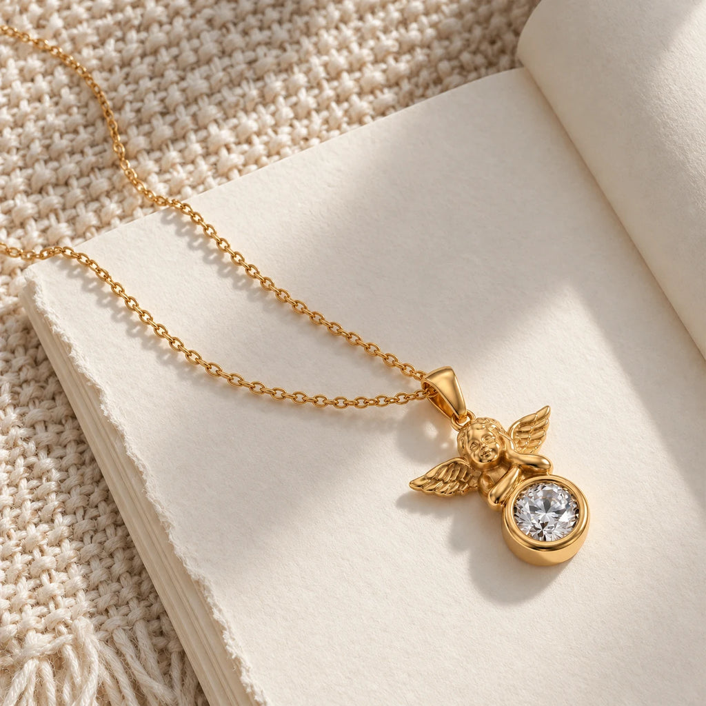Guardian Light Angel Necklace - flatlay art book