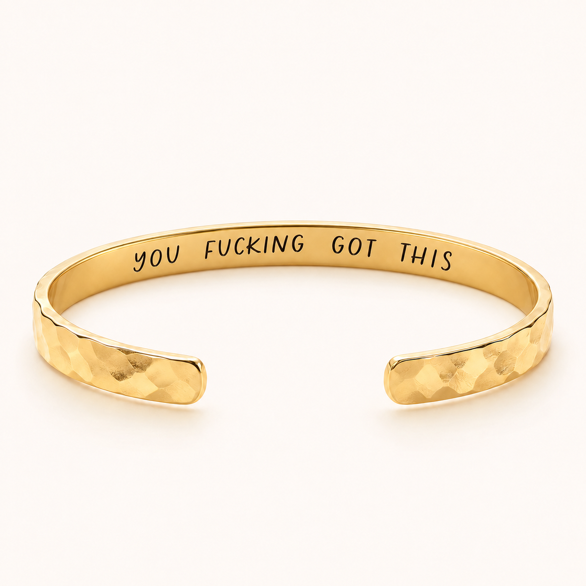 Gold hammered cuff with You Fucking Got This private inside engraving